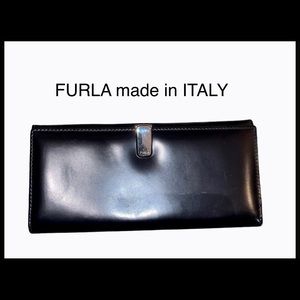 FURLA leather wallet with silver clasp.